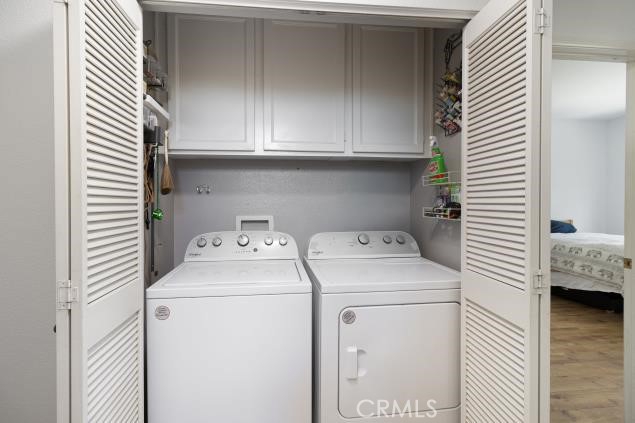 624 Corte Patio, Unit 81 Chula Vista, CA 91914 - Photo 17 of 35 a utility room with dryer and washer