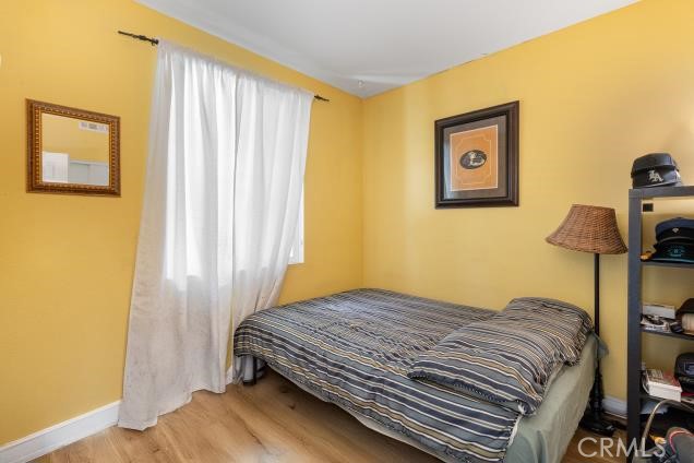 624 Corte Patio, Unit 81 Chula Vista, CA 91914 - Photo 18 of 35 a bedroom with a bed and a window