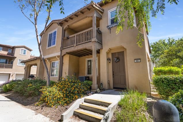 624 Corte Patio, Unit 81 Chula Vista, CA 91914 - Photo 32 of 35 front view of a house with a yard