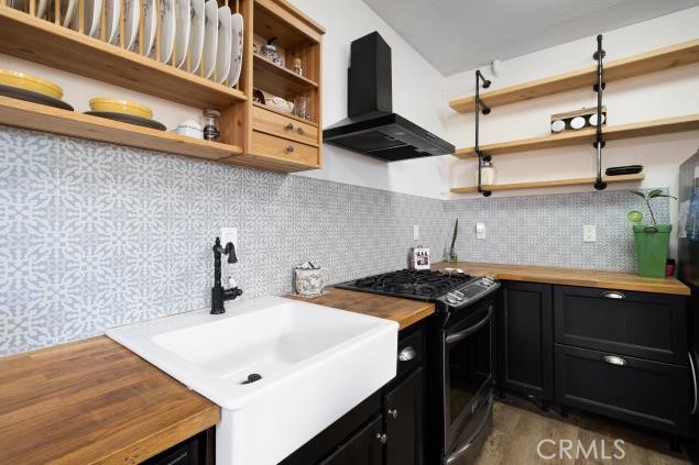 624 Corte Patio, Unit 81 Chula Vista, CA 91914 - Photo 10 of 35 a kitchen with stainless steel appliances granite countertop a sink a stove and cabinets