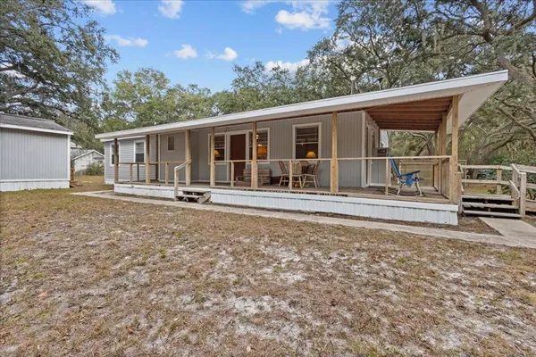 front view of a house with a patio