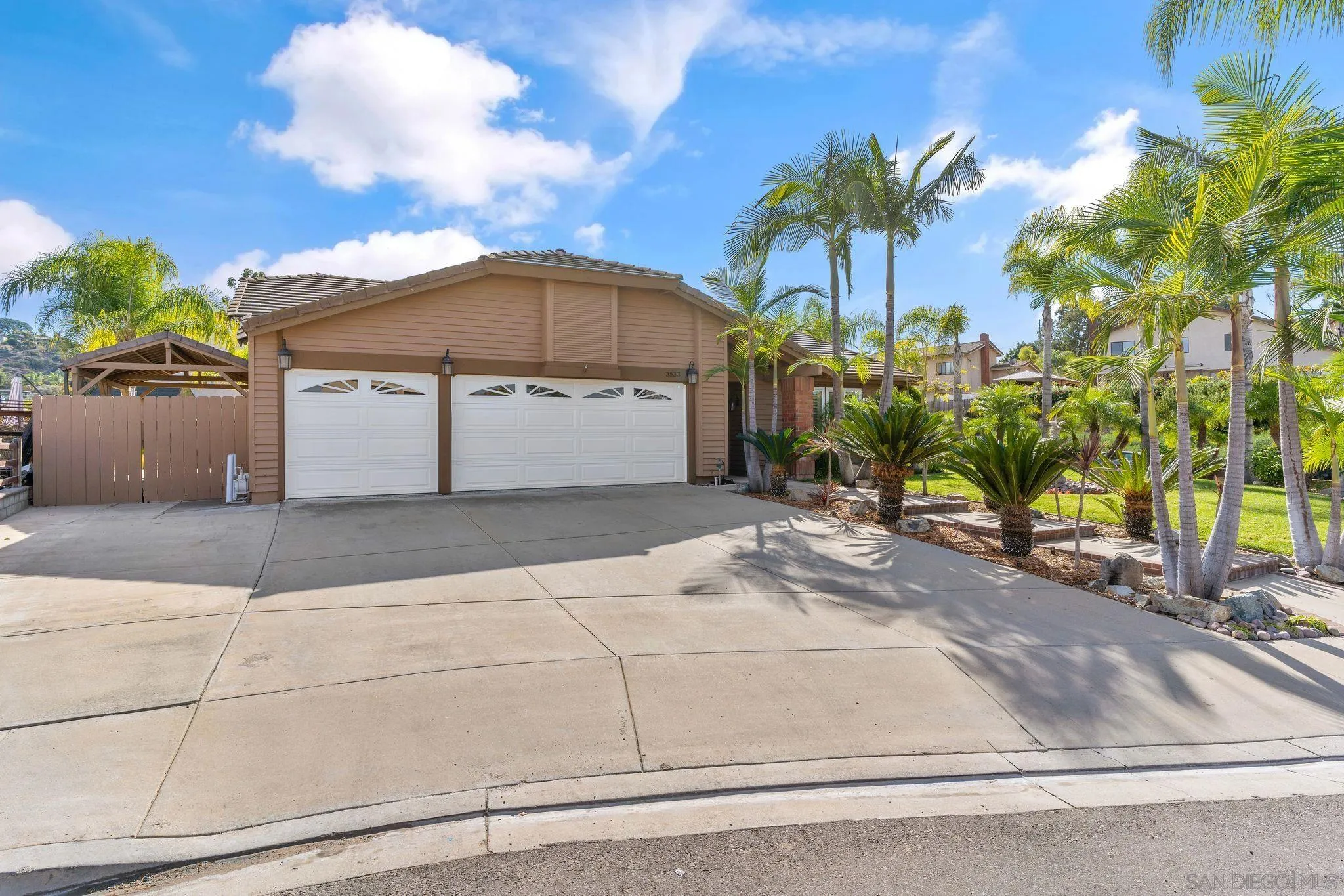 a house view with a garden space
