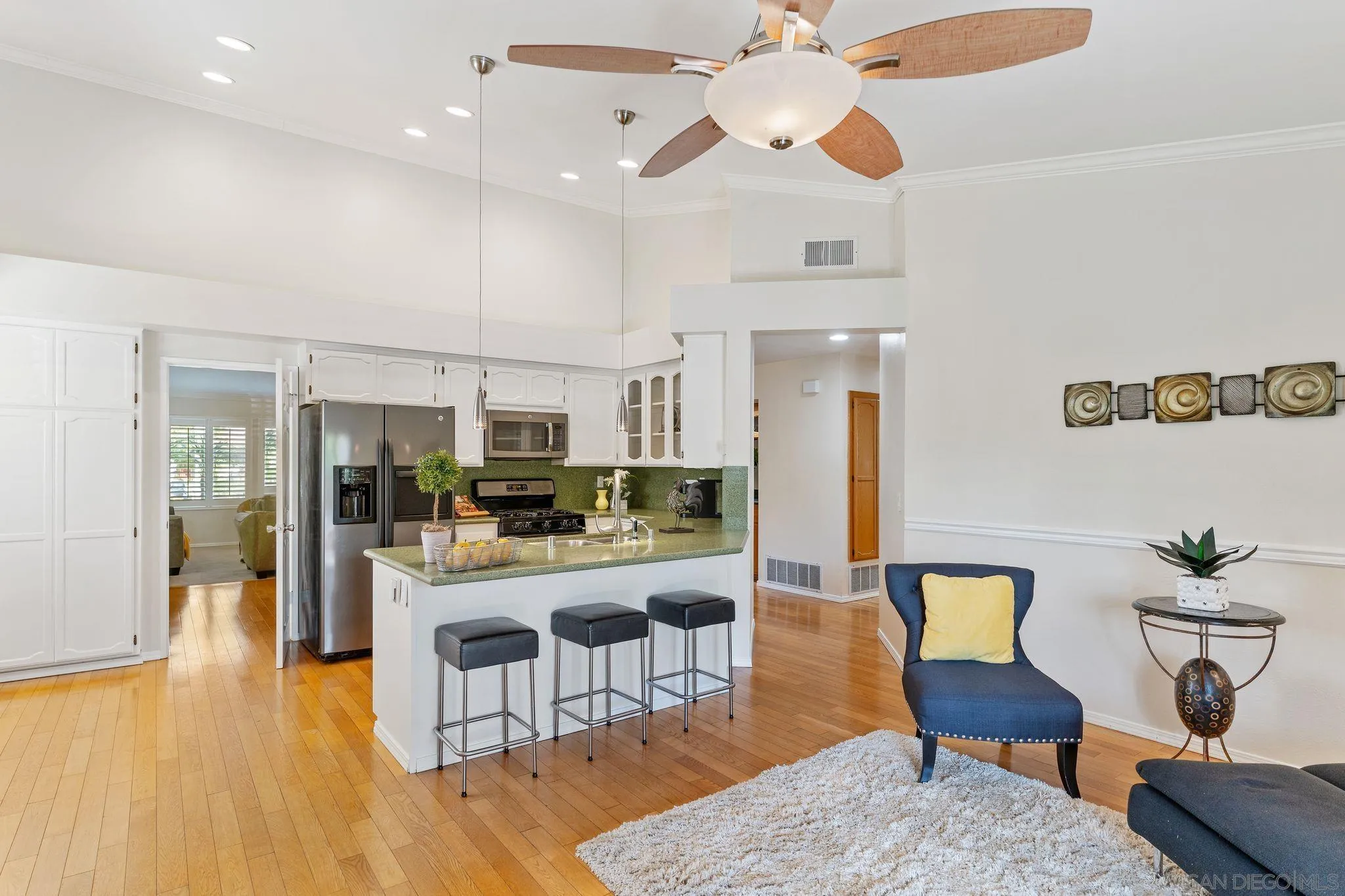 3533 Oakleaf Court Spring Valley, CA 91977 - Photo 11 of 38 a living room with furniture and kitchen view