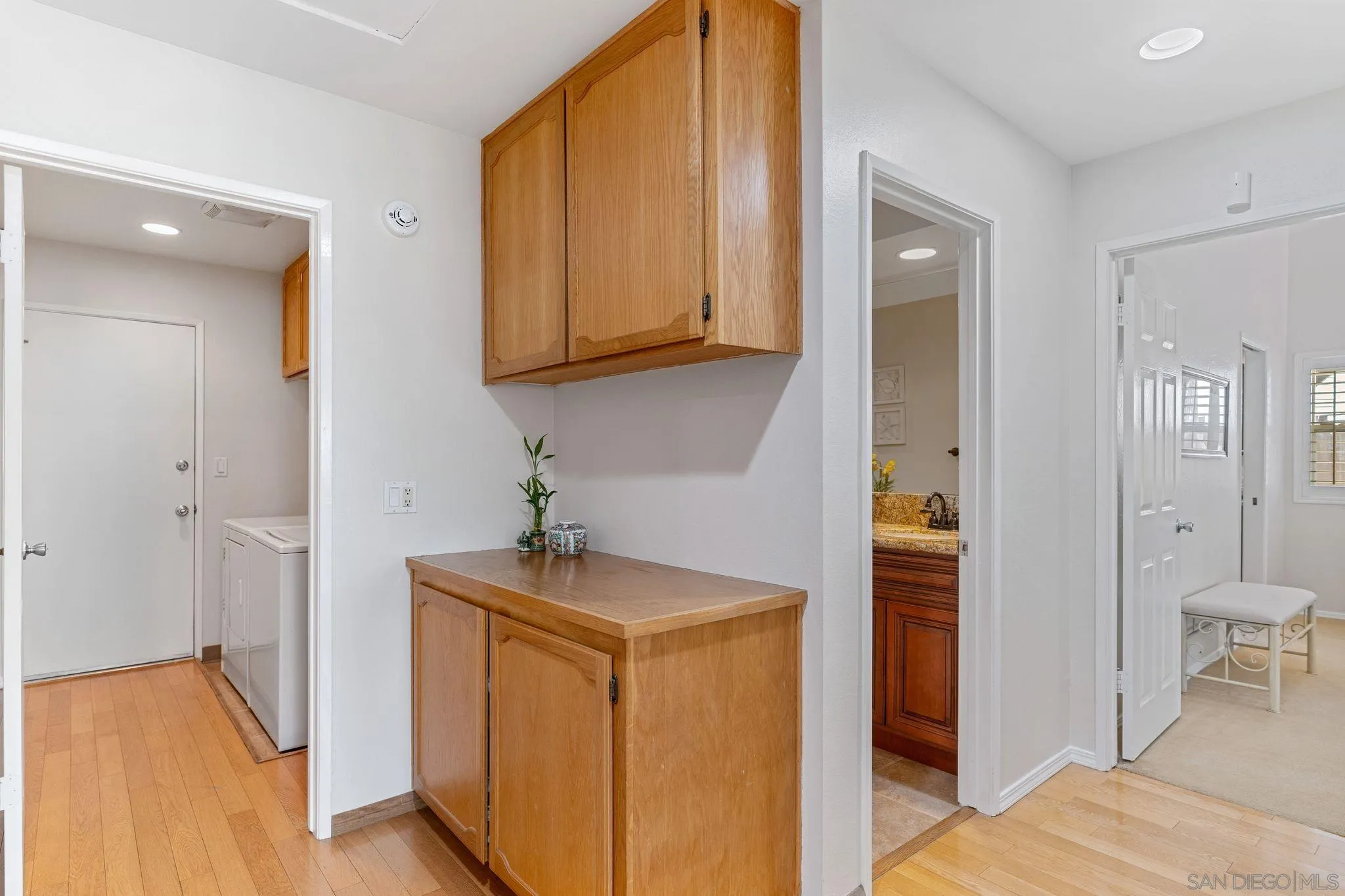 3533 Oakleaf Court Spring Valley, CA 91977 - Photo 14 of 38 a view of hallway with washer and dryer