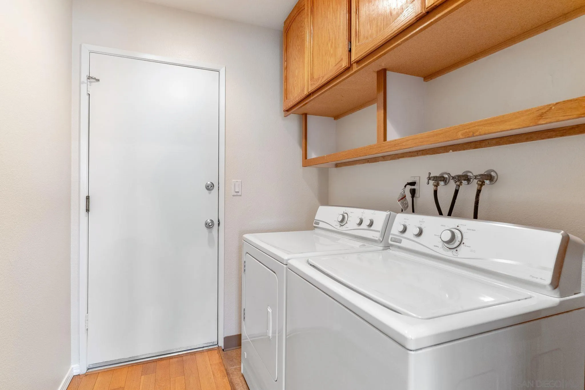 3533 Oakleaf Court Spring Valley, CA 91977 - Photo 15 of 38 a utility room with dryer and washer