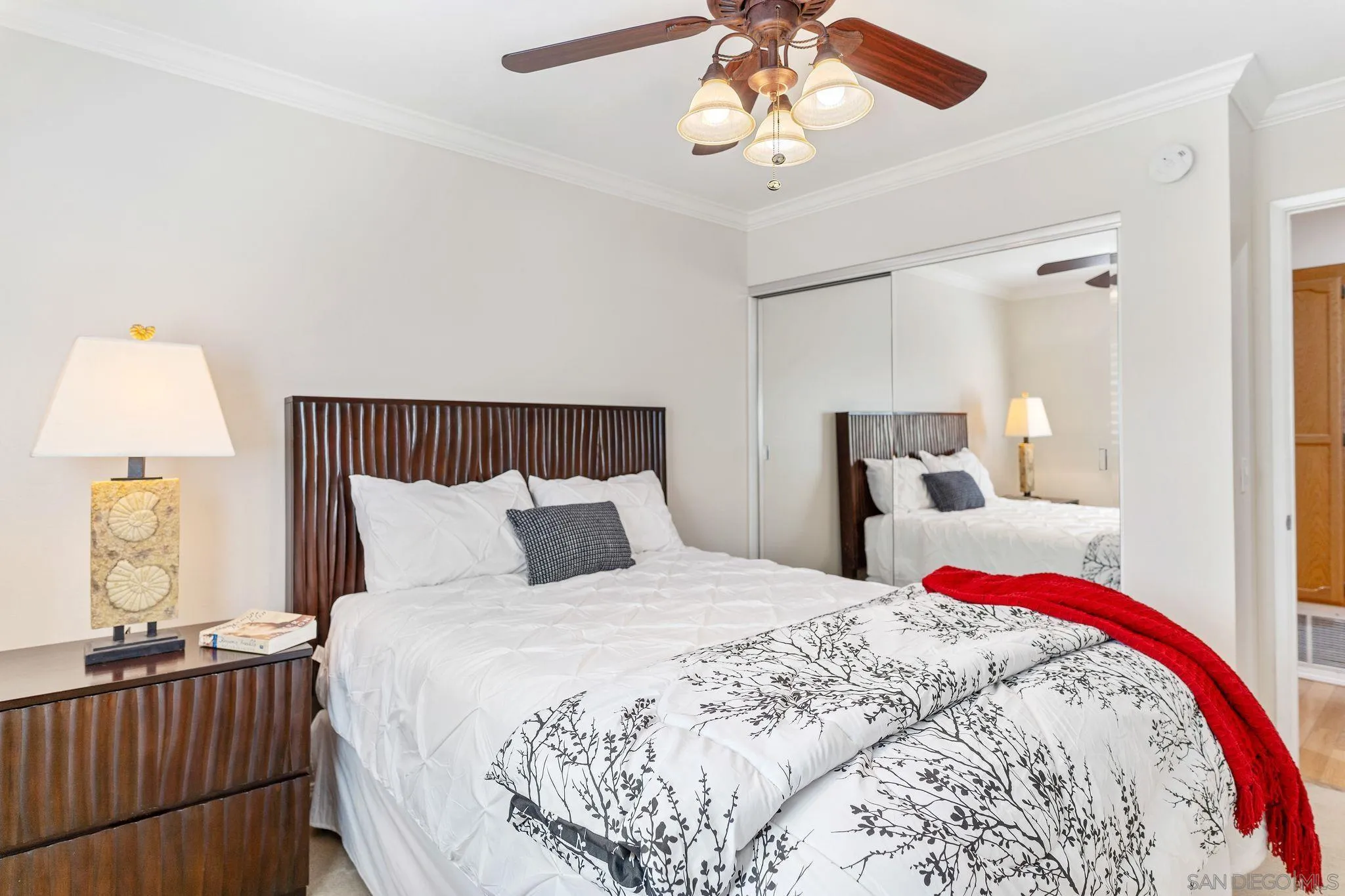 3533 Oakleaf Court Spring Valley, CA 91977 - Photo 17 of 38 a bedroom with a bed and wooden floor