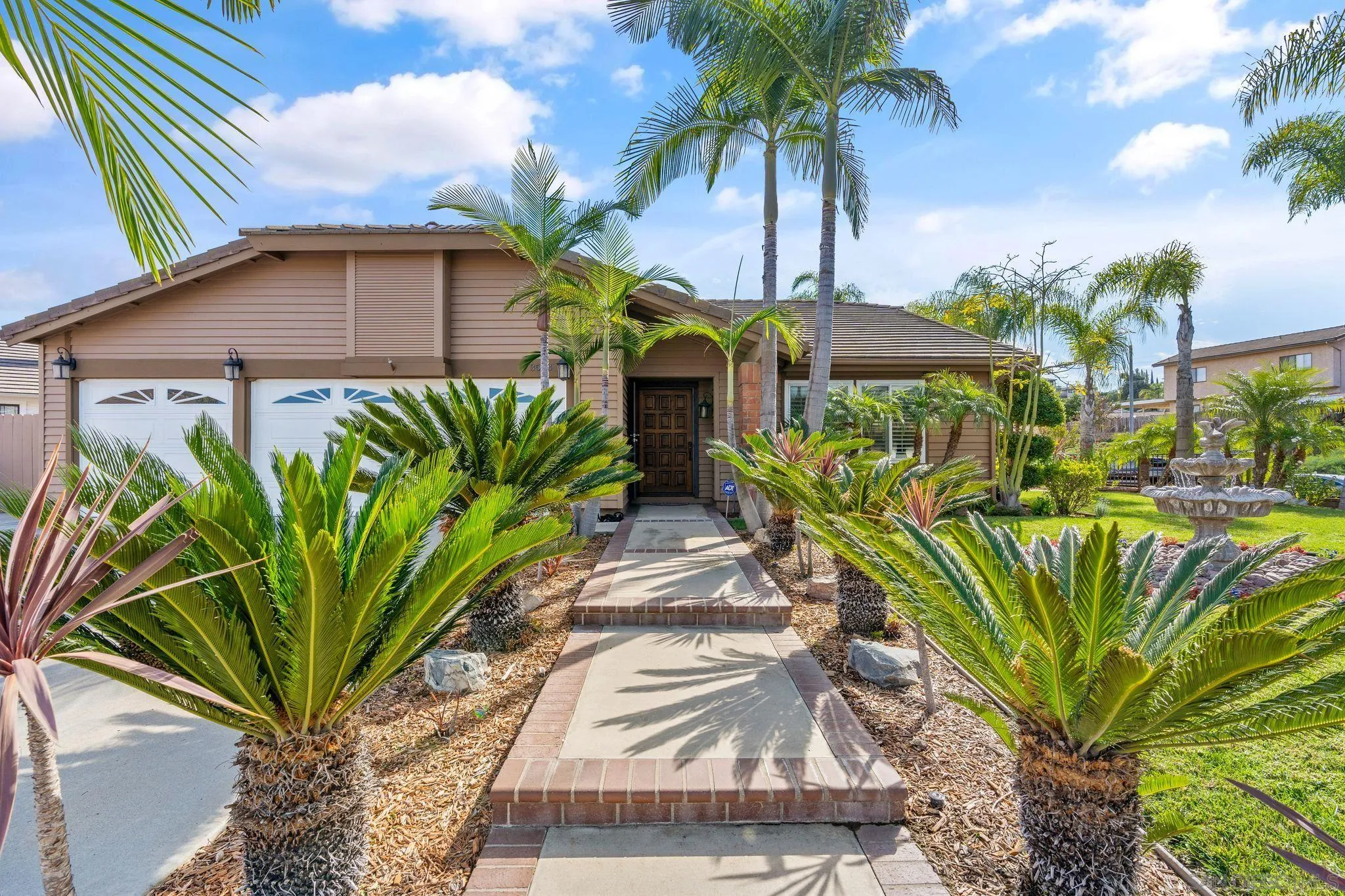 3533 Oakleaf Court Spring Valley, CA 91977 - Photo 2 of 38 a view of a plant in front of a house