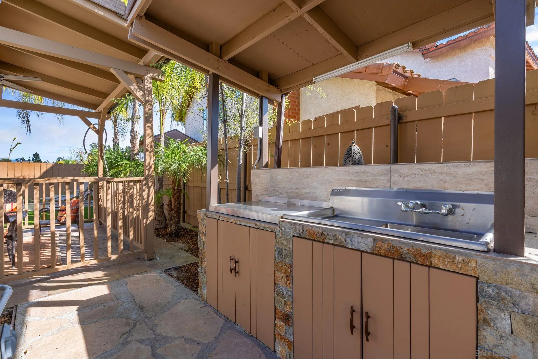 3533 Oakleaf Court Spring Valley, CA 91977 - Photo 25 of 38 a bathroom with a sink and mirror