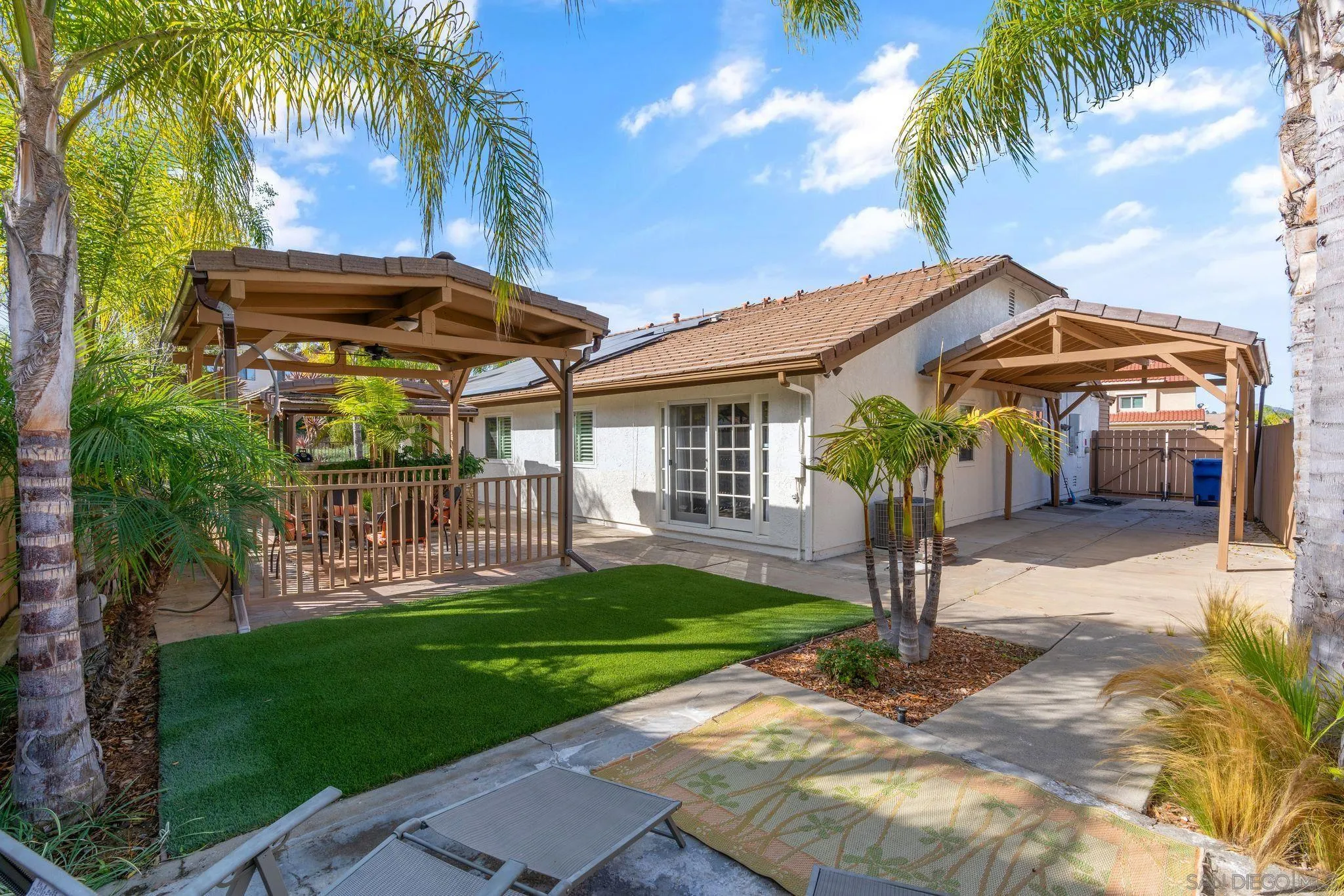 3533 Oakleaf Court Spring Valley, CA 91977 - Photo 27 of 38 a front view of a house with garden