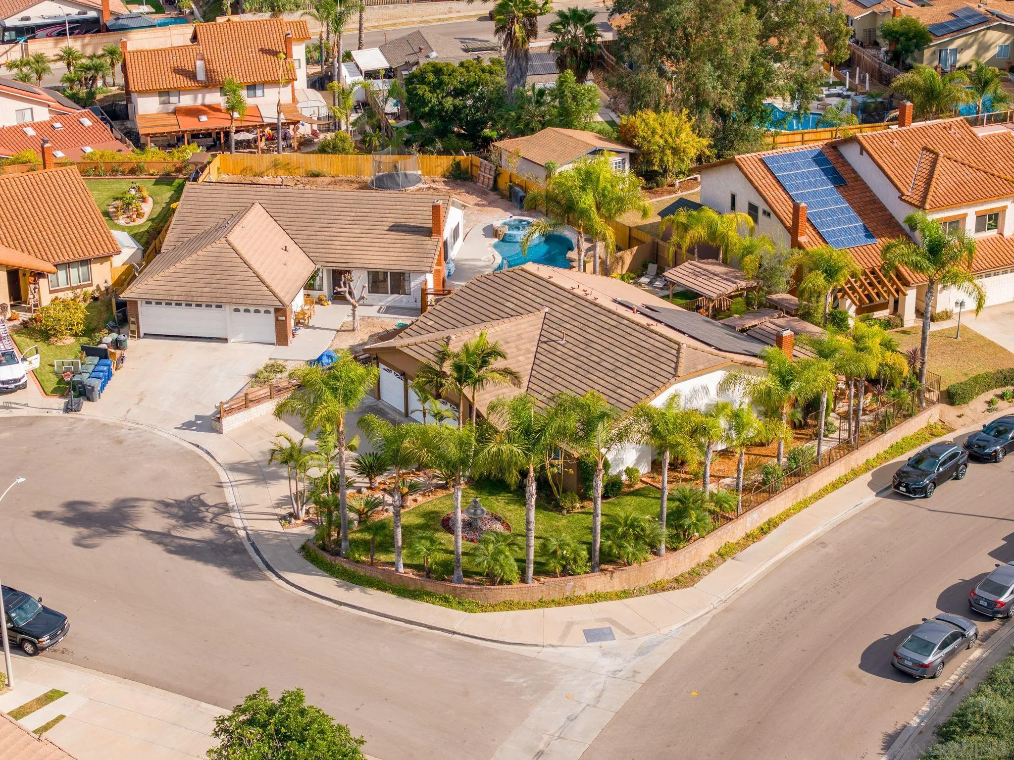 3533 Oakleaf Court Spring Valley, CA 91977 - Photo 32 of 38 a view of a swimming pool with outdoor seating and plants