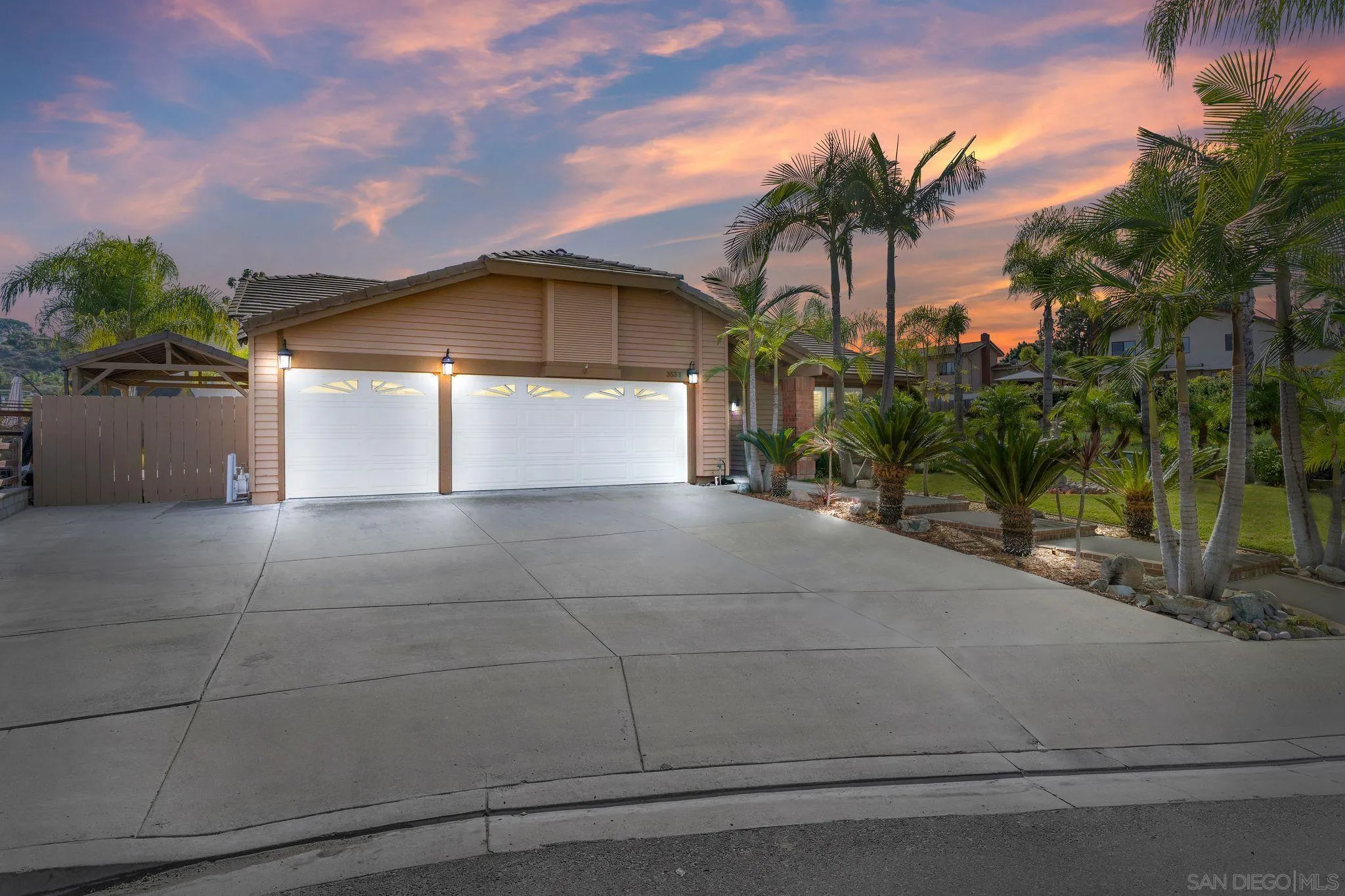 3533 Oakleaf Court Spring Valley, CA 91977 - Photo 35 of 38 a view of a house with a yard and palm trees