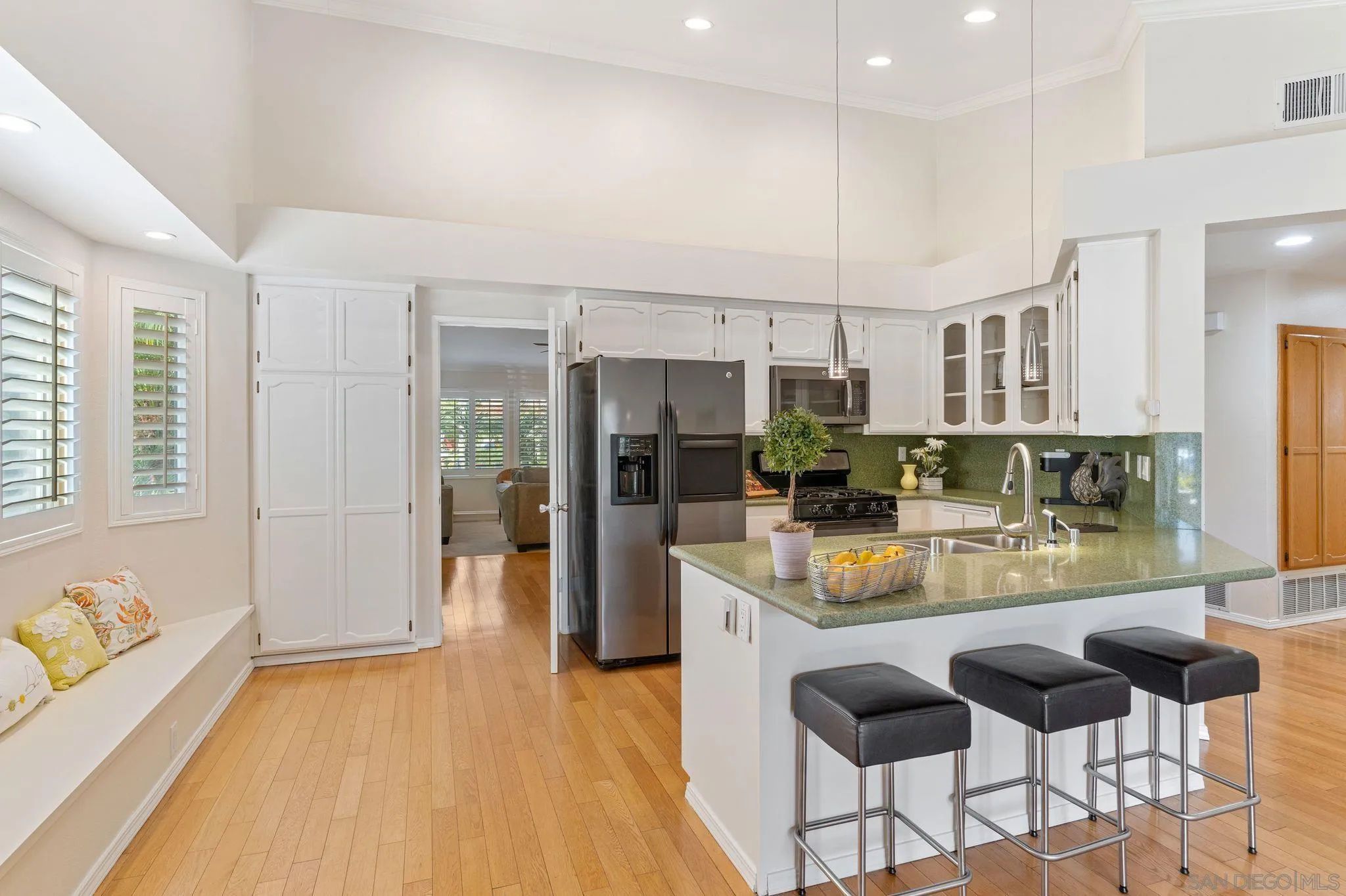 3533 Oakleaf Court Spring Valley, CA 91977 - Photo 10 of 38 a kitchen with stainless steel appliances granite countertop a refrigerator and a stove top oven