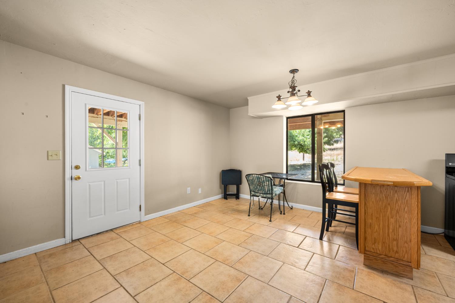 2162 Painted Pony Road Somerset, CA 95684 - Photo 32 of 65 a bedroom with furniture and a window