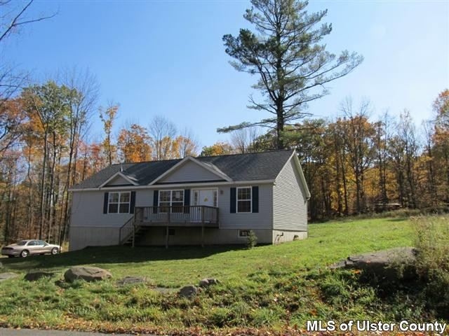 666 Oak Ridge Road Ellenville, NY 12428 - Photo 1 of 1 a view of a house with a yard