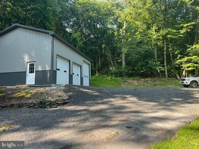 2185 Welsh Road Mohnton, PA 19540 - Photo 6 of 21 a view of a house with a backyard