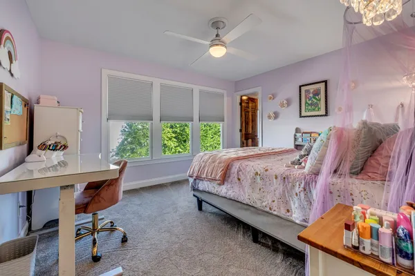 a bedroom with a bed and a walk in closet