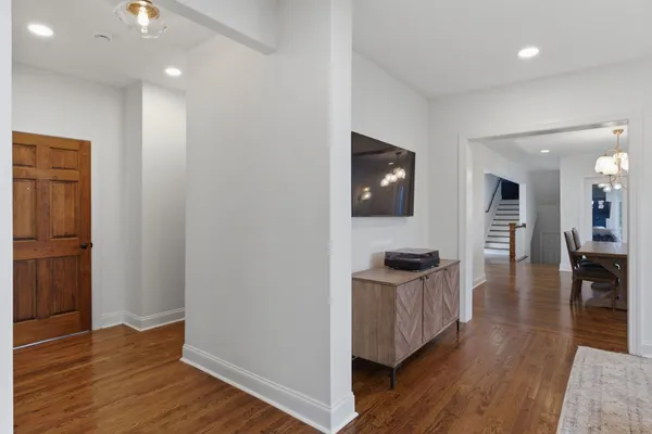 a living room with furniture and flat screen tv