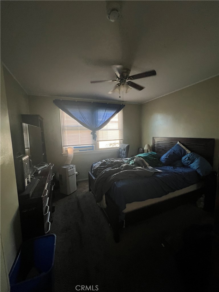 1750 Cabrillo Avenue Torrance, CA 90501 - Photo 15 of 25 a large bed sitting in a room next to a window