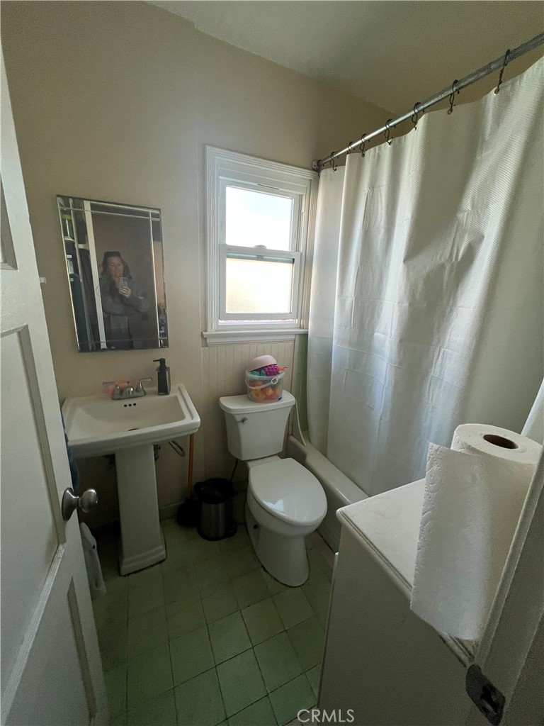 1750 Cabrillo Avenue Torrance, CA 90501 - Photo 23 of 25 a bathroom with a sink toilet and shower