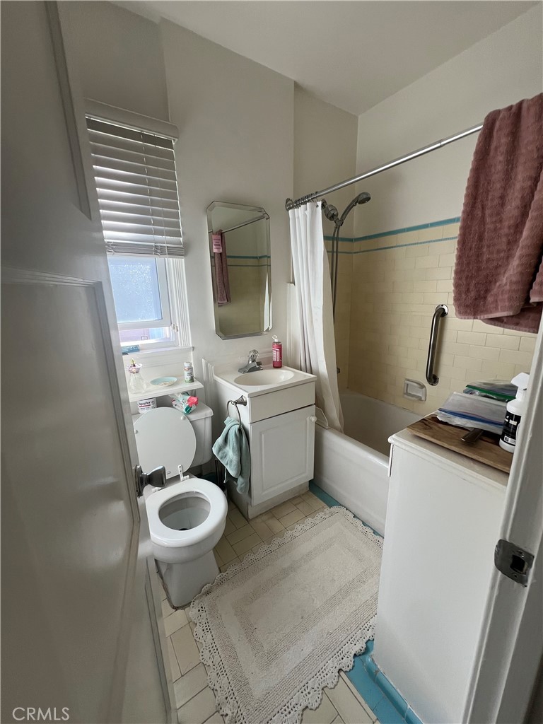 1750 Cabrillo Avenue Torrance, CA 90501 - Photo 10 of 25 a bathroom with a sink toilet and shower