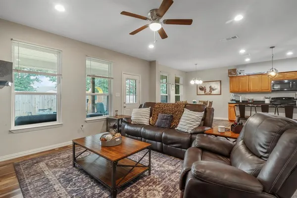 a living room with furniture and a window
