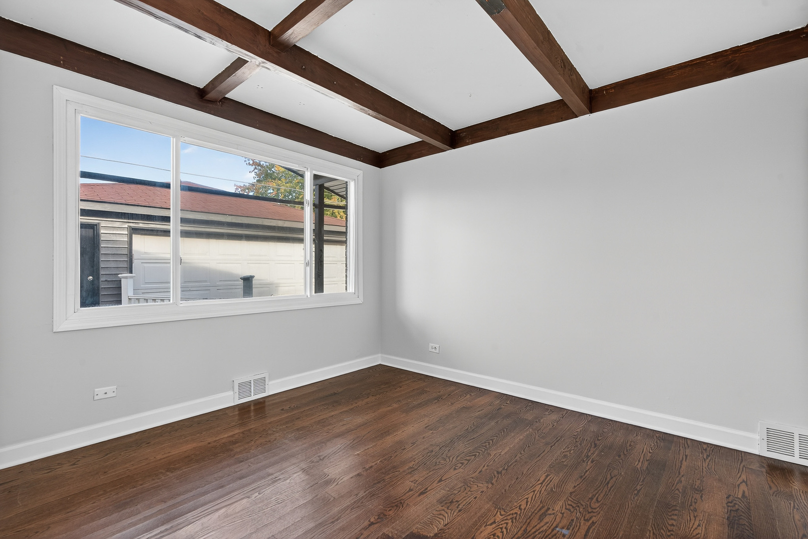 7818 West Argyle Street Norridge, IL 60706 - Photo 14 of 24 a view of empty room with wooden floor and fan