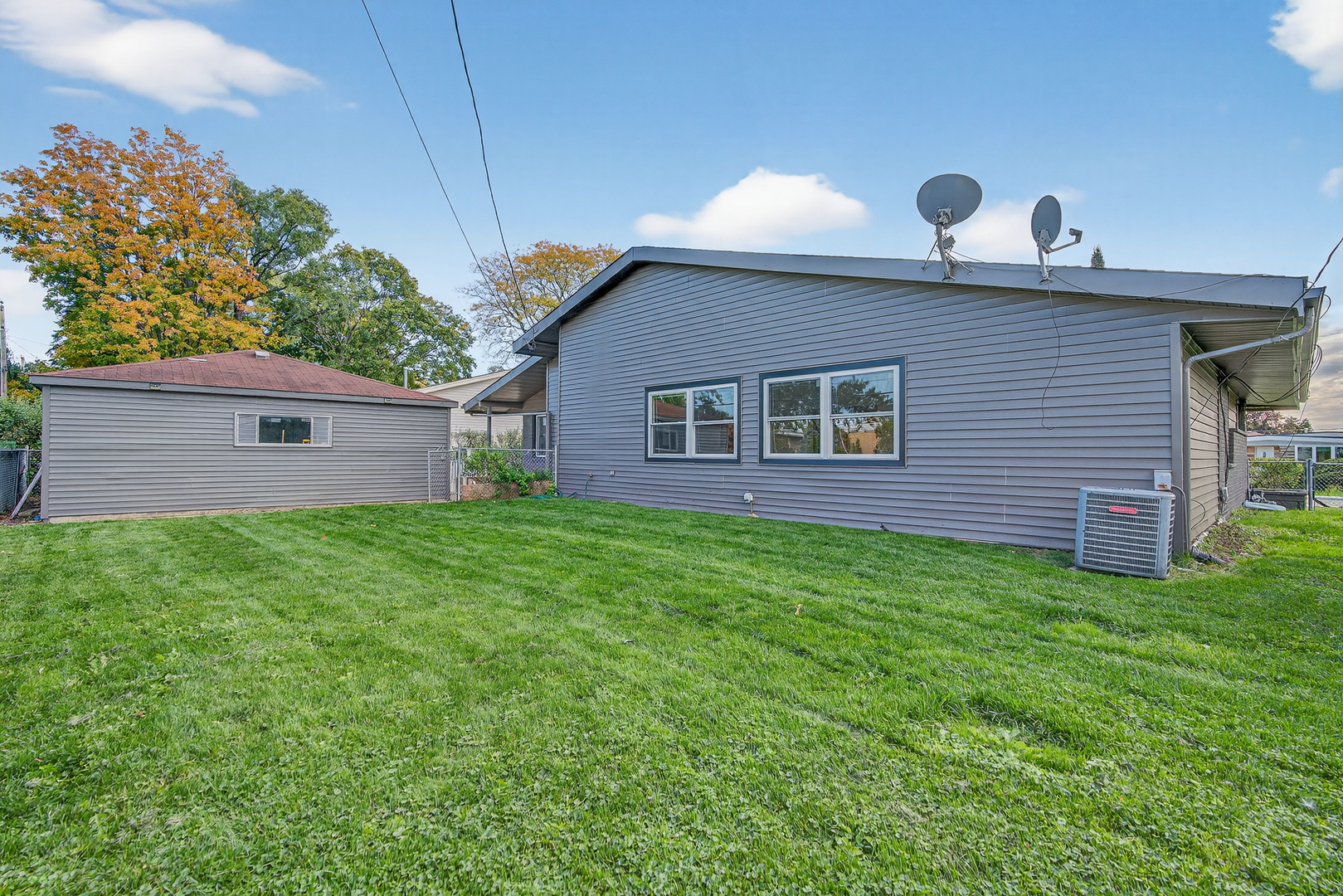 7818 West Argyle Street Norridge, IL 60706 - Photo 21 of 24 a view of a house with a backyard
