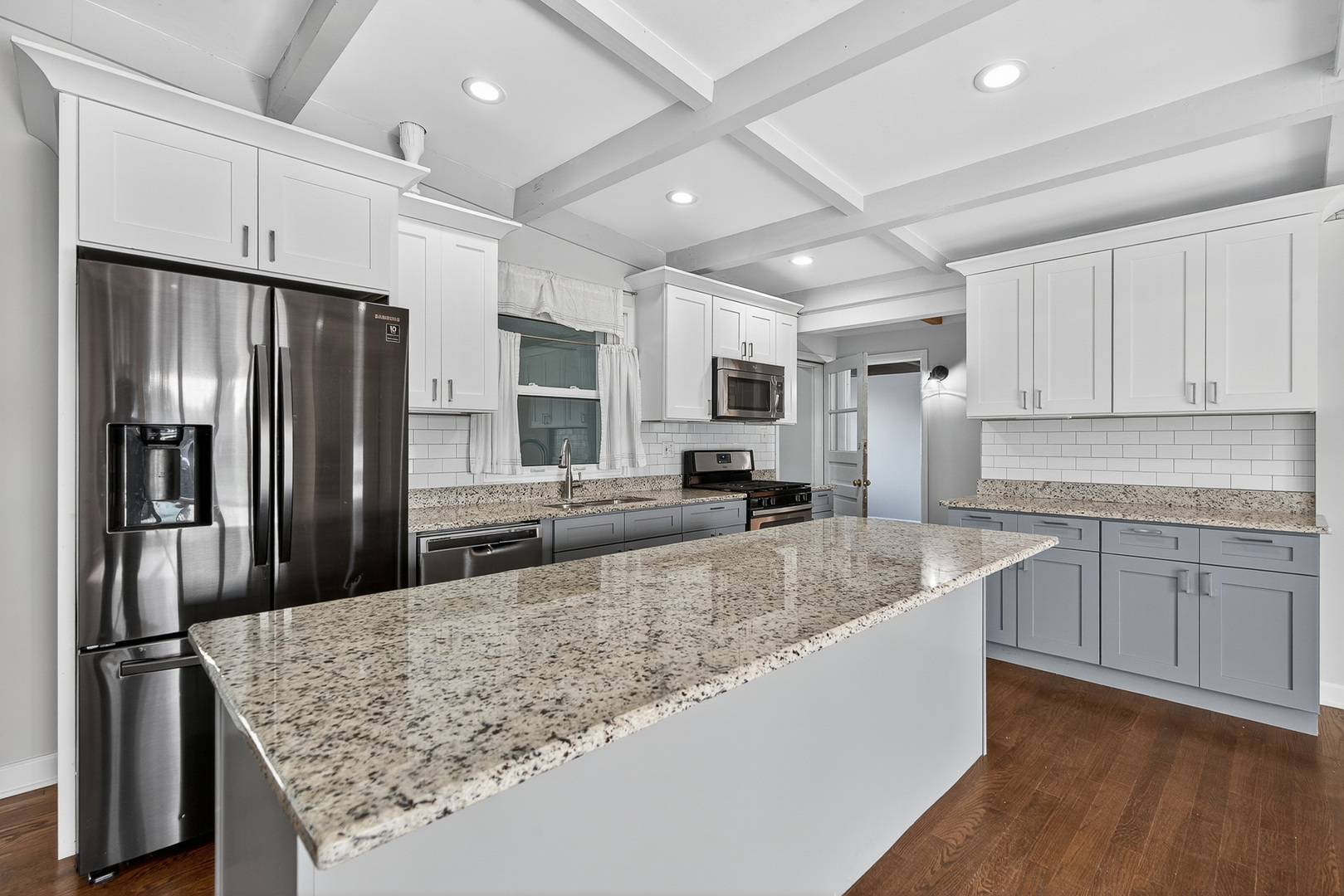 7818 West Argyle Street Norridge, IL 60706 - Photo 5 of 24 a kitchen with stainless steel appliances granite countertop a refrigerator sink and stove