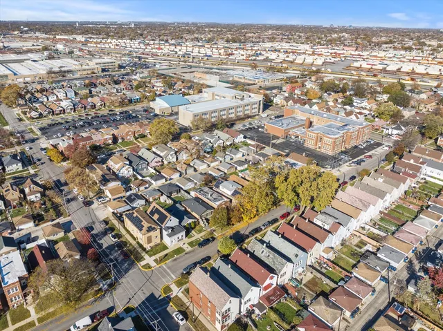 an aerial view of residential building with parking space