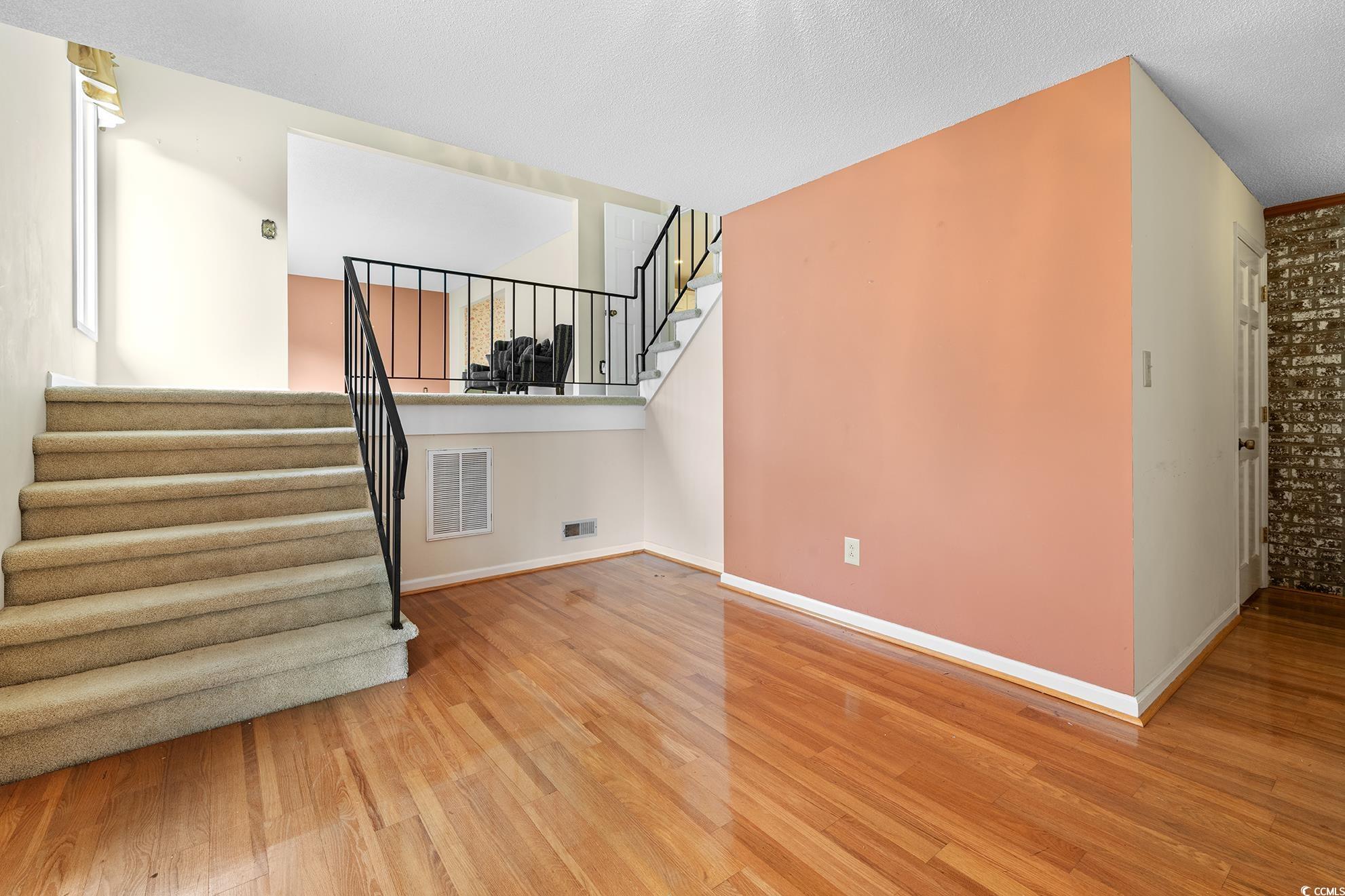 1002 Pyatt Street Georgetown, SC 29440 - Photo 8 of 30 Foyer featuring beautiful hardwood floors