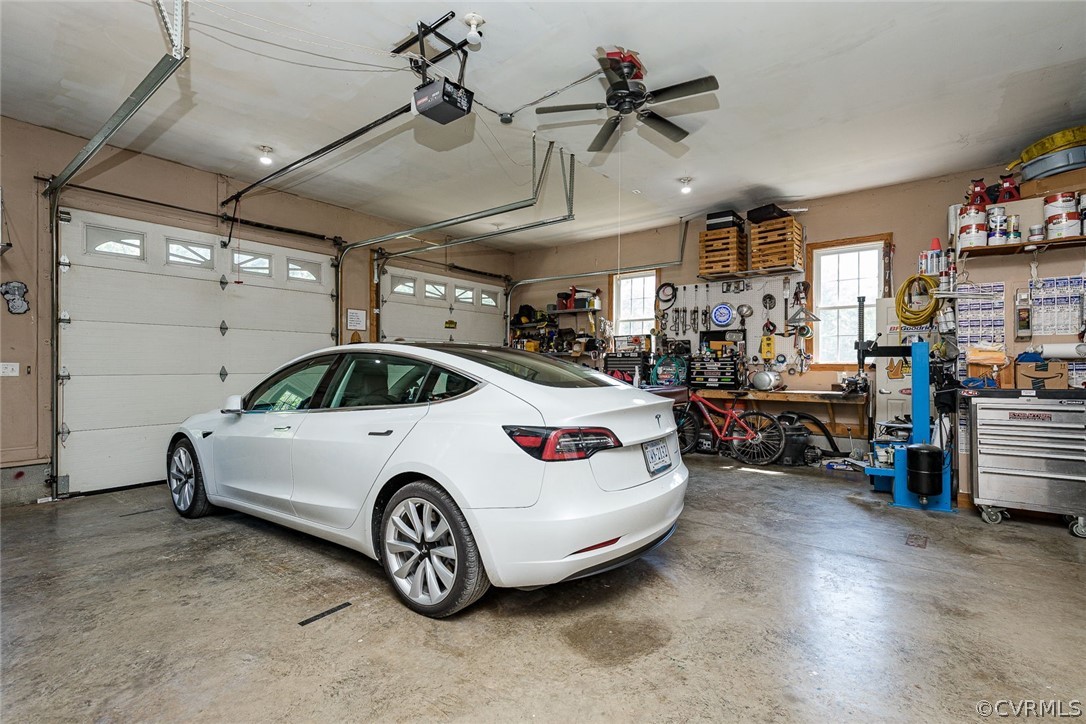 11253 Rocky Ridge Road Glen Allen, VA 23059 - Photo 34 of 50 Garage has work bench and 1/2 bath