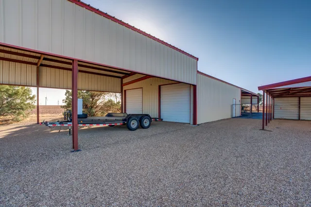 a view of a big room with windows and air conditioner