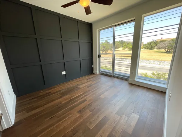 a view of a room with a large window