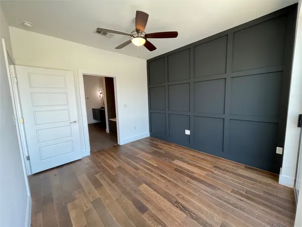 a view of a livingroom with a hardwood floor