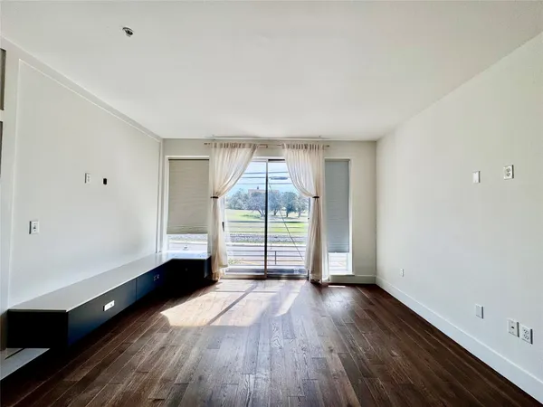 a kitchen with a sink and a refrigerator