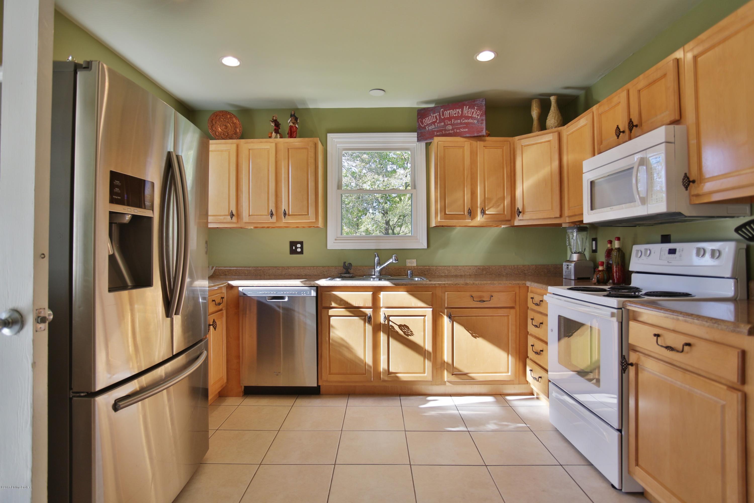 426 Wood Road Louisville, KY 40222 - Photo 23 of 38 Maple cabinetry & tile floors