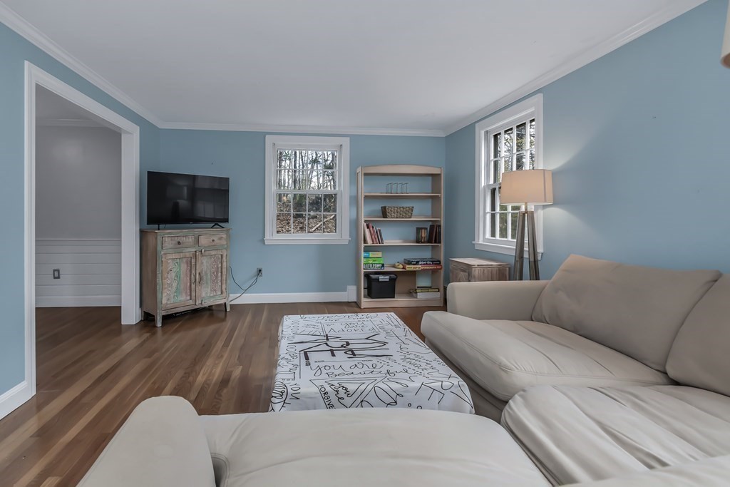 21 Stage Coach Road Boxford, MA 01921 - Photo 12 of 40 a living room with furniture and a flat screen tv