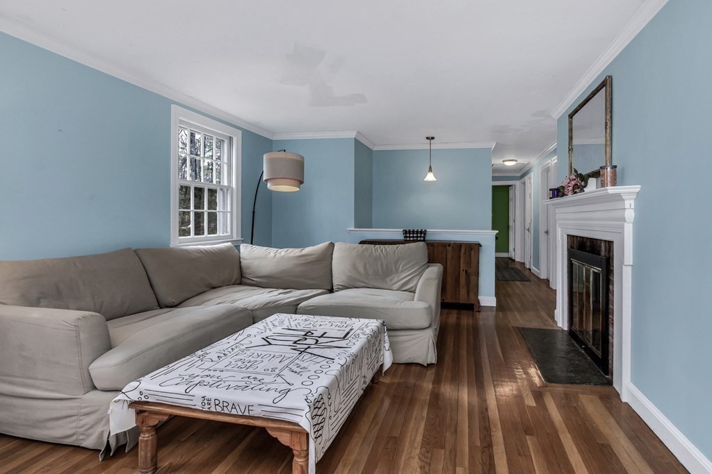 21 Stage Coach Road Boxford, MA 01921 - Photo 13 of 40 a living room with furniture and a fireplace