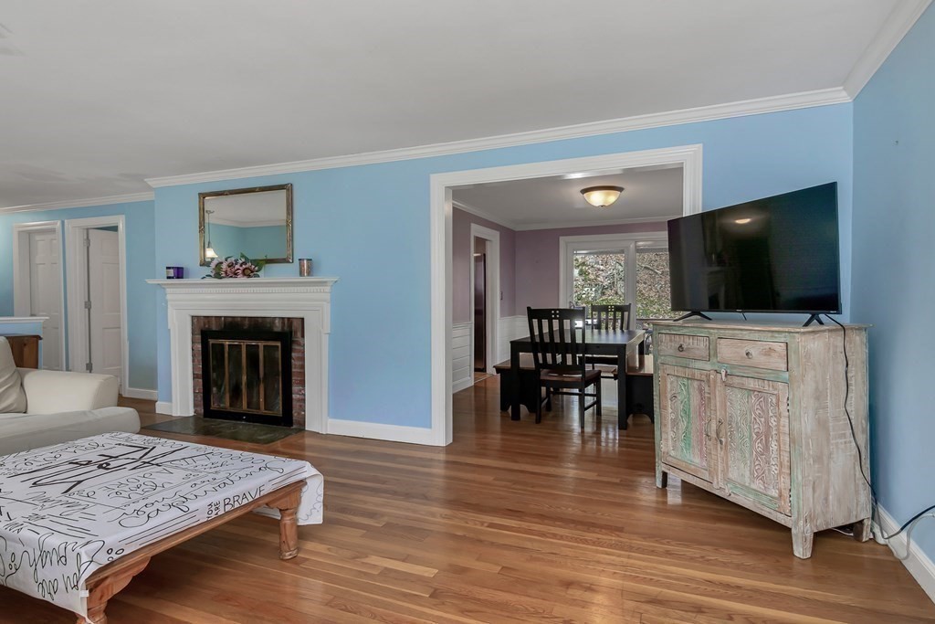 21 Stage Coach Road Boxford, MA 01921 - Photo 14 of 40 a living room with furniture and a fireplace