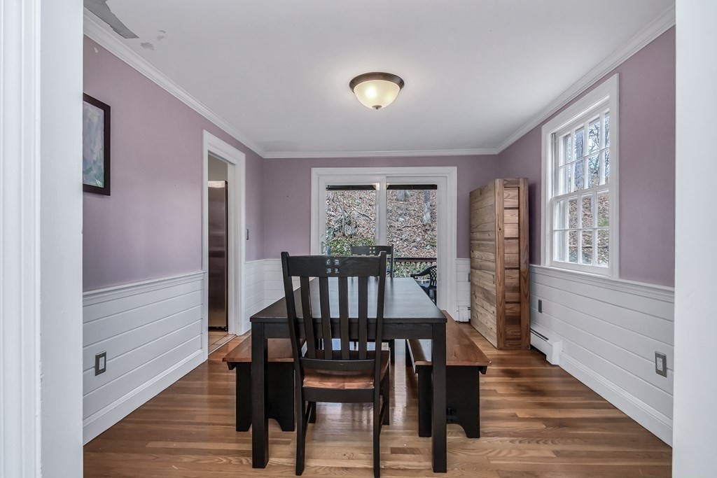 21 Stage Coach Road Boxford, MA 01921 - Photo 16 of 40 a view of a a dining room with furniture window and wooden floor