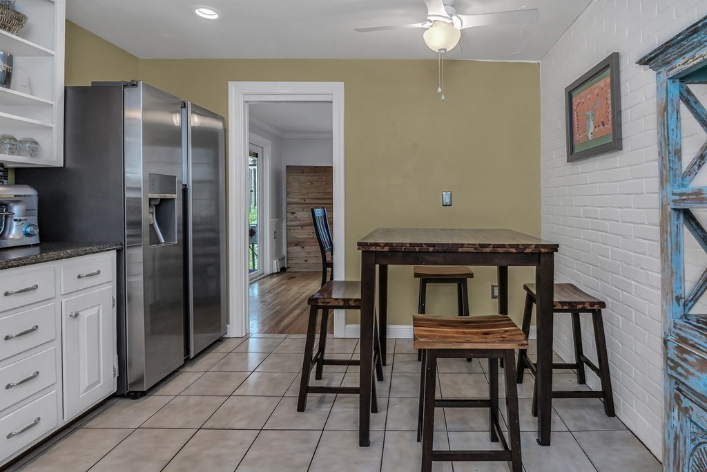 21 Stage Coach Road Boxford, MA 01921 - Photo 23 of 40 a kitchen with a refrigerator a stove and cabinets