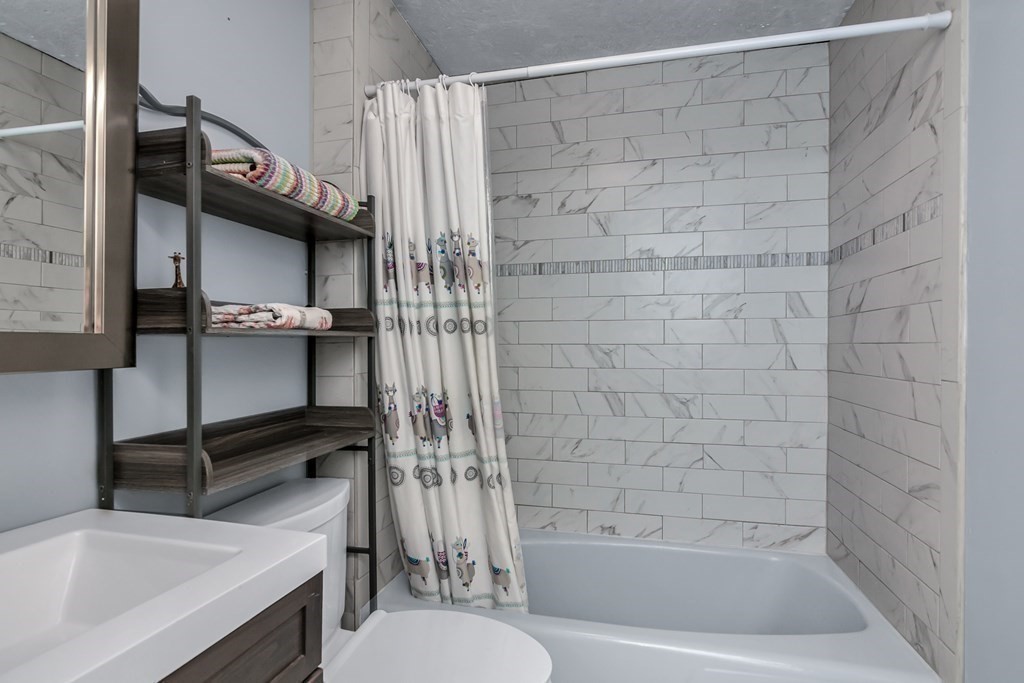 21 Stage Coach Road Boxford, MA 01921 - Photo 24 of 40 a bathroom with a sink a toilet and shower
