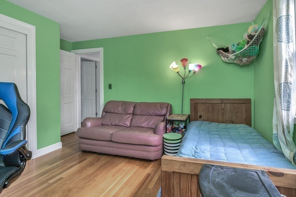 21 Stage Coach Road Boxford, MA 01921 - Photo 30 of 40 a living room with furniture and a lamp