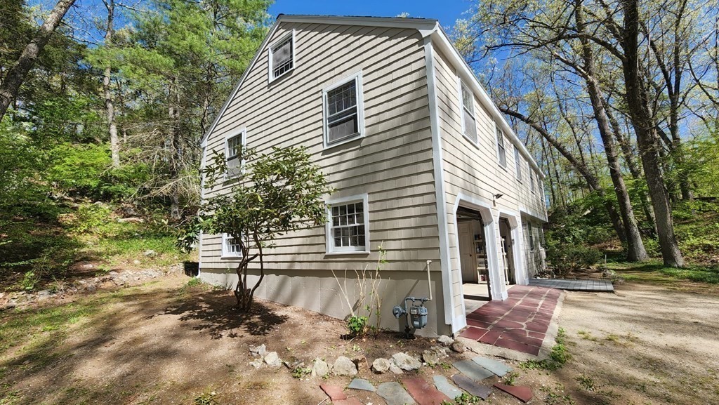 21 Stage Coach Road Boxford, MA 01921 - Photo 3 of 40 a view of a house with a yard