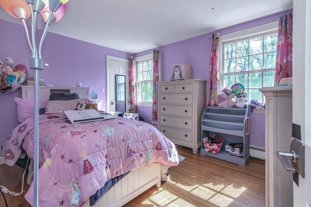 21 Stage Coach Road Boxford, MA 01921 - Photo 31 of 40 a bedroom with a bed and a couch