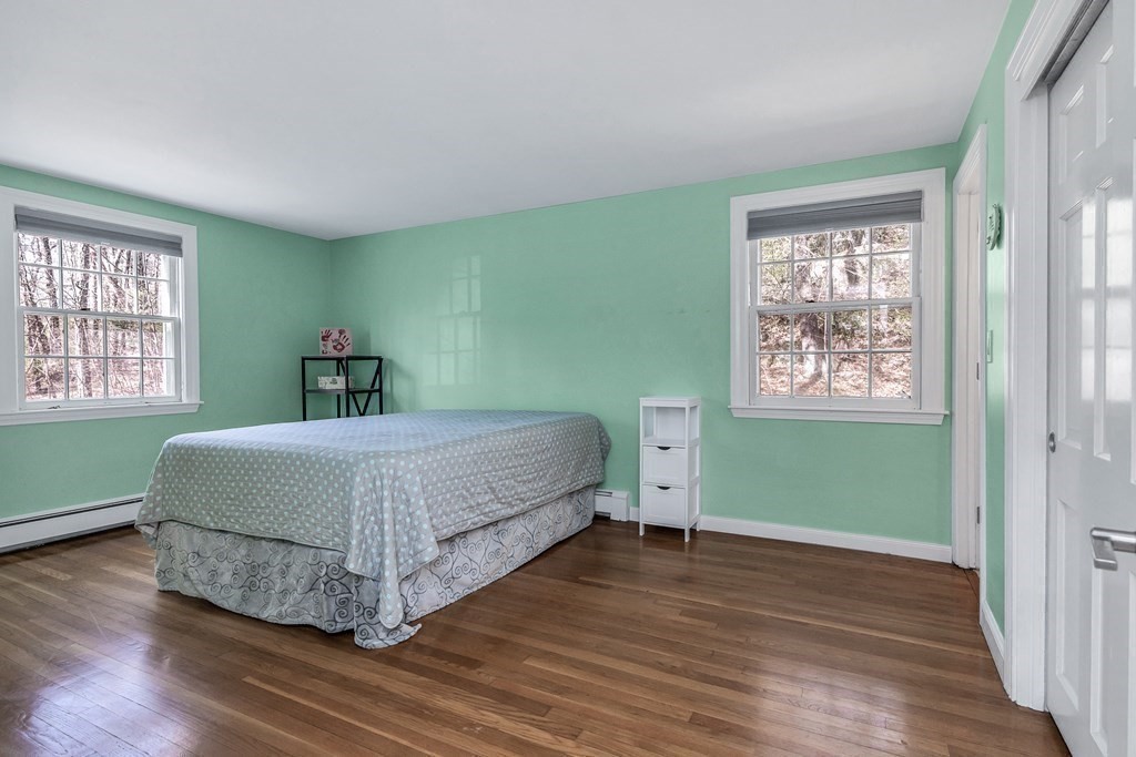 21 Stage Coach Road Boxford, MA 01921 - Photo 32 of 40 a bedroom with a bed and a window