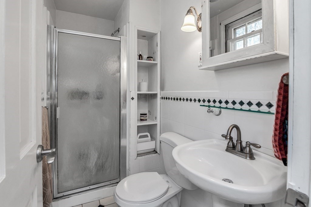 21 Stage Coach Road Boxford, MA 01921 - Photo 35 of 40 a bathroom with a sink toilet and shower
