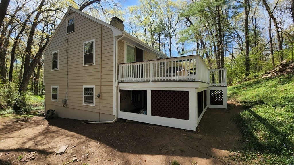 21 Stage Coach Road Boxford, MA 01921 - Photo 6 of 40 a view of a house with a yard