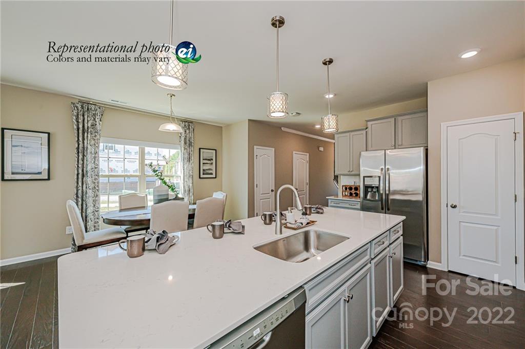 6563 Gopher Road, Unit 350 Lancaster, SC 29720 - Photo 5 of 22 a kitchen with sink refrigerator and window