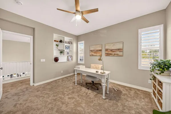 a room with furniture and a flat screen tv